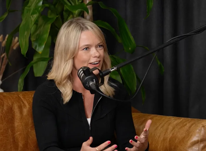 Holly Bailey on the Hear Me ROAR podcast, sharing insights on female leadership, wellness, and founding Play Like a Girl.