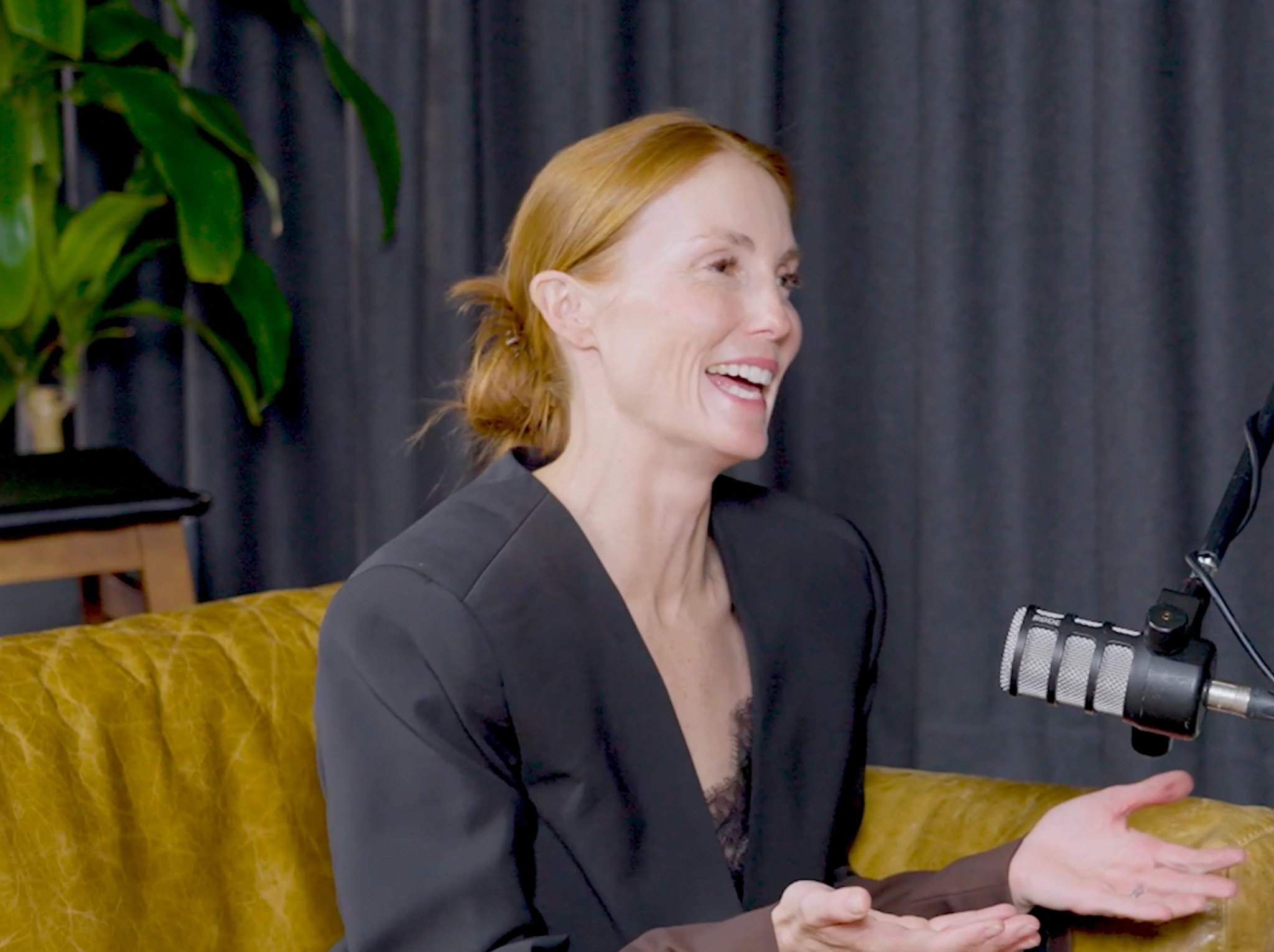 Rosie Dumbrell founder of Everform Therapywear smiling with four children in studio setting